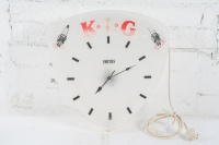 KLG: A c1960s K.L.G spark plugs wall clock by Smiths, fading seen to red lettering, right hand side spark plug missing top, 44cm high, 43.5cm wide