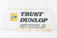 DUNLOP: An original double sided Dunlop 'Trust Dunlop Steels' advertising sign, 45cm high, 90cm wide