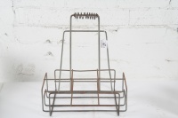 BOTTLE RACK: An original six bottle wire rack as suited for oil bottles