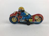 MIXED: Four small 7.5 cm friction bikes, 2 x Police, civilian & racing RN77, all made in Japan. - 2