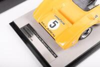 McLAREN M8F:&nbsp;A Tecnomodel 1:18 scale McLaren M8F&nbsp;Can Am model, the #5&nbsp;race car that was driven to victory in the 1971 Mosport race meeting, in the famous McLaren orange&nbsp;livery&nbsp;driven by Denny Hulme - 2