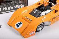 McLAREN M8B:&nbsp;A GMP 1:18 scale McLaren M8B high wing model,&nbsp;the #4&nbsp;race car that was driven to championship victory&nbsp;in the 1969 Can Am series, in the traditional&nbsp;McLaren orange paintwork,&nbsp;driven by Bruce McLaren - 2