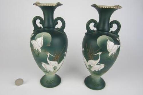 VASES: A pair of oriental vases featuring cranes