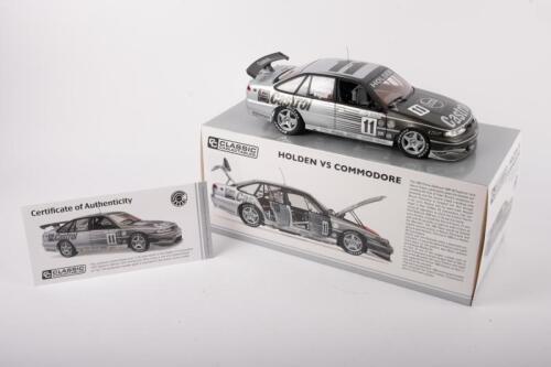 HOLDEN VS COMMODORE: A 1:18 scale Holden VS Commodore, the number #11 race car, as raced to victory at Bathurst 1997, driven by Larry Perkins & Russell Ingall, finished in a 25th anniversary silver livery