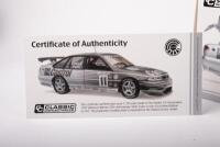 HOLDEN VS COMMODORE: A 1:18 scale Holden VS Commodore, the number #11 race car, as raced to victory at Bathurst 1997, driven by Larry Perkins & Russell Ingall, finished in a 25th anniversary silver livery - 2