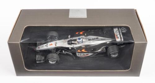 MCLAREN MERCEDES: A Minichamps 1:18 scale McLaren Mercedes MP4/15, driver Mika Hakkinen, in Mercedes-Benz Collection box
