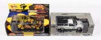 FORD: Two Classic Carlectables 1:43 scale Ford AU Falcons in boxes, includes a Jim's Mowing Ute and a 2002 VIP Petfoods Racing Team sedan