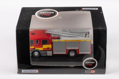 SCANIA: An Oxford Fire 1:76 scale Scania Surrey Fire & Rescue ladder vehicle in box