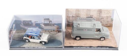 373 · 007: Two 1:43 scale James Bond magazine model cars, including Mini Moke 'Live and Let Die' with Leyland Sherpa Van 'The Spy Who Loved Me', each in acrylic case