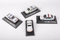 POLICE: A group of four approximately 1:43 scale Police vehicles including a Volkswagen Beetle, Belgium Mercedes, Czech Skoda and a Slovakia BMW