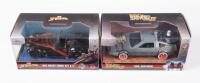 MOVIE CARS: Two approximately 1:32 scale JADA toys movie cars including the Back to the Future Time Machine and Marvel Spiderman Shelby Cobra, boxed