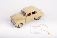HOLDEN: A Trax 1:24 scale 1948-53 Holden 48-215 FX (TX-020), in Burnley cream, red&nbsp;interior, opening features, engine detail, cream wheels with chrome hubs, steerable wheels