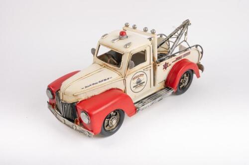 TOW TRUCK: A Boyle Industries modern metal tow truck ornamental model, 33cm long, in box