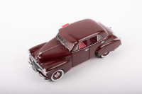 HOLDEN: A Trax, 1:24 scale, Holden FJ Special sedan in maroon&nbsp;and red & white interior