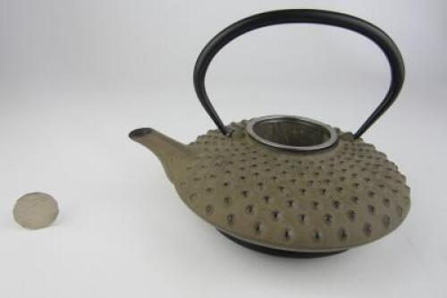 TEAPOT: A Japanese cast iron ceremonial tea pot on stand