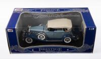 CADILLAC: A 1:18 scale Anson Models 1932 Cadillac Sport Phaeton in two tone blue with beige coloured soft top, within box