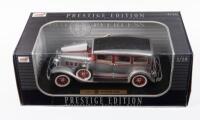 PEERLESS: A 1:18 scale Anson models 1931 Peerless saloon in silver with red accents, within original box