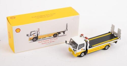 SHELL: An approximately 1:64 scale Toyeast Isuzu N series Shell flatbed tow truck, within box