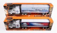 KENWORTH: Two Newray models 1:43 scale Kenworth W900 trucks, one in Newcastle Knights livery, the other in Airforce livery