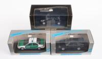 FORD: Three Minichamps 1:43 scale Ford models in boxes, includes a 1997 Ka hatchback, a Mondeo police car and a Escort Cosworth hatchback