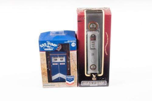GAS PUMPS: Two 1:18 scale replica gas pumps, including Greenlight, Standard double pump and a Eagle Gasoline pump by Road Signature, boxed.
