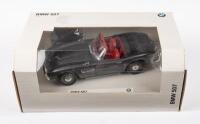 BMW: A 1:18 scale BMW 507 coupe in grey with red interior, model made by Revell for BMW, within original packaging