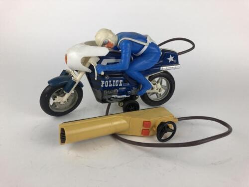 POLICE: Police bike made by Joustra France, 26 cms, battery remote.