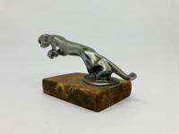 JAGUAR: A mounted 'leaper' mascot on timber base [Location: Sydney] - 2