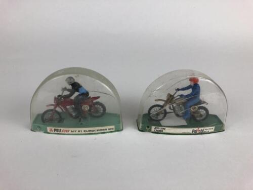 DIECAST: Two Polistil Poli Toys in plastic domes, 1/43 scale, made in Mexico by McGregor Manufacturing c1970s.