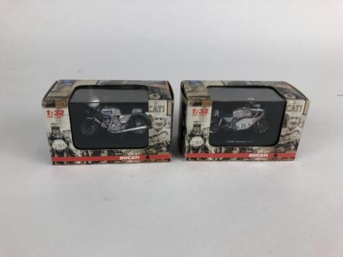 DIECAST: Two contemporary New Ray 1/32 Ducati bikes, mint boxed.
