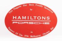 SIGN: An enamel oval shaped metal sign used by Hamilton Porsche to promote their support for the Melbourne 1996 Olympic bid, 45cm high, 30cm wide