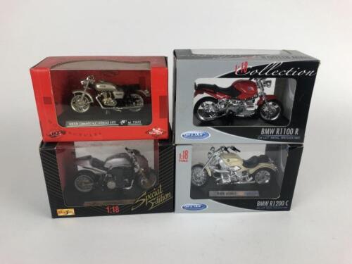 DIECAST: Four boxed contemporary 1/18 motor cycle models made in China & Spain.