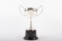 L.C.C.A / ALAN HAMILTON: A silver plated two handled trophy on bakelite base inscribed 'L.C.C.A (Light Car Club Australia) - Jack Day Trophy - 1964-65 - Most Improved - L.C.C.A driver - A.D. Hamilton