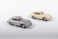 356A: Two approximately 1:43 scale Porsche 356A models by Dinky including one period c1950s Dinky Toys No.182 model in cream and one c1990s in silver