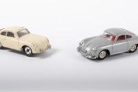 356A: Two approximately 1:43 scale Porsche 356A models by Dinky including one period c1950s Dinky Toys No.182 model in cream and one c1990s in silver - 2