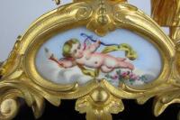 CLOCK: A late 19th century French porcelain panelled gilt metal mantle clock - 5