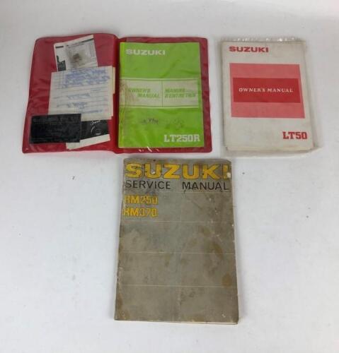 SUZUKI: Three Suzuki owners and workshop manuals, LT250R Quad and LT50 Quad and RM250/370