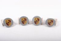 WHEELS CAPS: A set of Porsche NOS wheel centre caps, made in 2002, in boxes