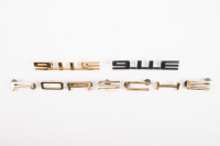 BADGES: A set of Porsche 911 E, engine lid badges
