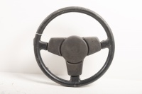 STEERING WHEEL: A Porsche 911 1977-83 steering wheel with horn pad