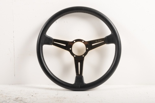 NARDI: A NOS Nardi steering wheel, leather with gold centre in box