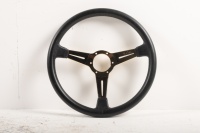 NARDI: A NOS Nardi steering wheel, leather with gold centre in box