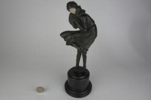 ART DECO: An Art Deco style figure titled 'The Squall' of a windswept lady after Chiparus