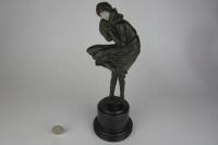 ART DECO: An Art Deco style figure titled 'The Squall' of a windswept lady after Chiparus