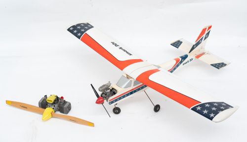 TARTAN TWIN 77: A model aeroplane Tartan Twin 77 engine, thought to be 44cc with Tartan 24-6 propeller attached, also included is an already assembled RPM Snark 20T radio controlled model aeroplane