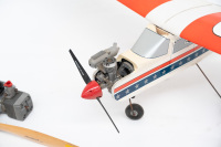 TARTAN TWIN 77: A model aeroplane Tartan Twin 77 engine, thought to be 44cc with Tartan 24-6 propeller attached, also included is an already assembled RPM Snark 20T radio controlled model aeroplane - 2