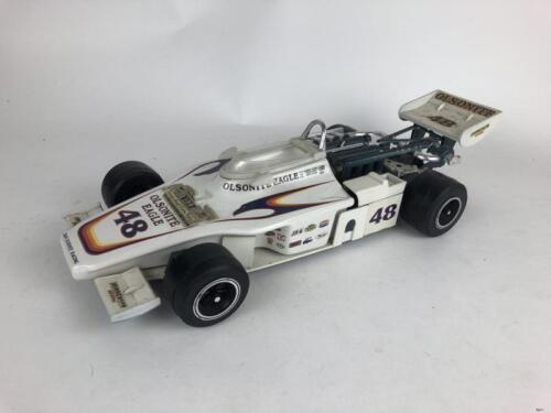 JIM BEAM: One original 1979 sealed Olsonite Indy Car 1 Ltr Jim Beam bottle