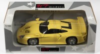 PORSCHE: A NOS 1:18 scale UT Models Porsche 911 1997 GT1 - Yellow, die-cast model