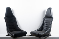 FRONT SEATS: A pair of front seats to suit a circa 1974-77 Porsche 911, one is leather, the other velour