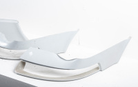 FENDERS: A group of four front mudguard corners to suit conversion to back date for Porsche 911 - 4